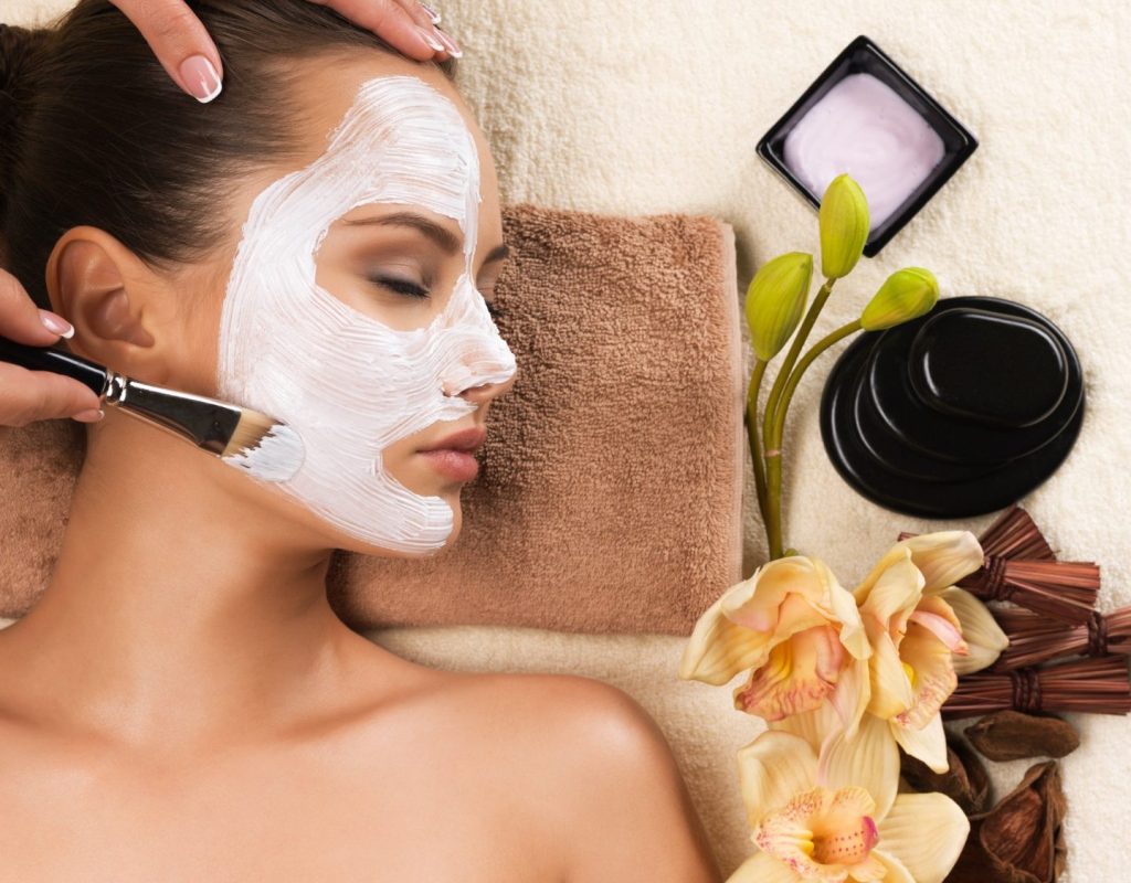 woman-having-a-facial-cosmetic-mask-at-spa-salon--e1672052311383.jpg